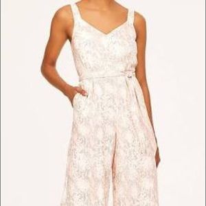 LOFT Pale pink snake skin jumpsuit.